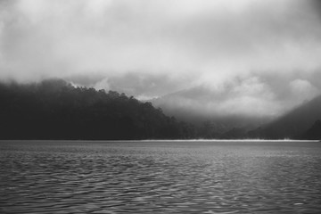 The mist in the lake in the morning. (vintage tone)