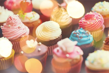Tasty Colorful cupcakes on background - obrazy, fototapety, plakaty