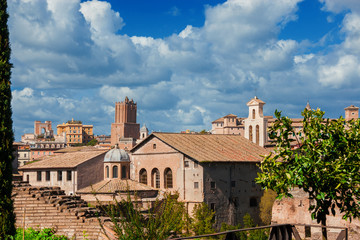 Rome historic center old skyline above Imperial Fora with medieval Tower of Militia, old churches...