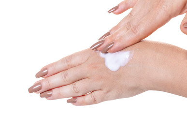 female hands in cosmetic cream