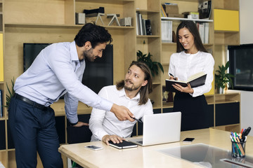 Young busimesspeople working in modern office