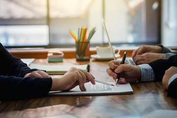 Businessman signed a contract agreement to invest together.