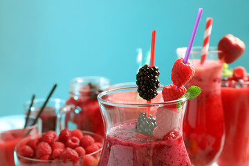 Glass with tasty berry smoothie, closeup