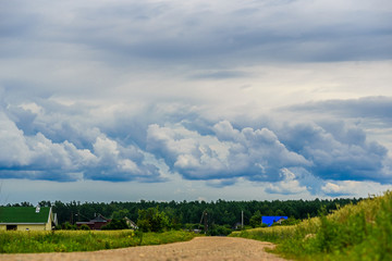 rain clouds over the forest