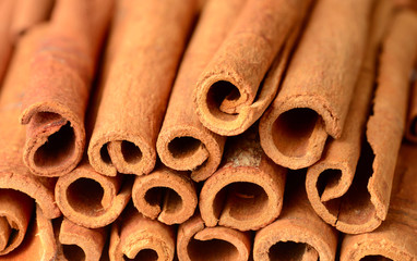 food background of cassia cinnamon sticks