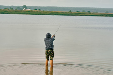 fisherman on the lake