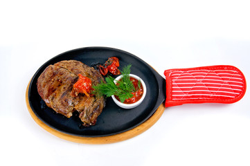 Roasted meat steak with tomatos