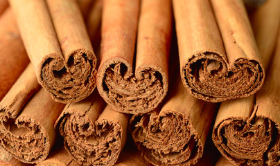 food background of ceylon cinnamon sticks - obrazy, fototapety, plakaty