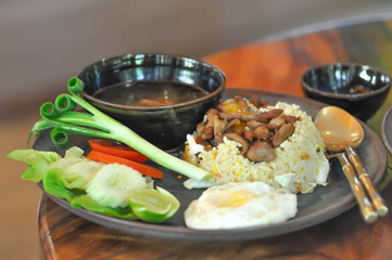 stir-fried rice with fried pork topping