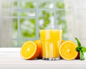 Orange juice and slices of orange © BillionPhotos.com