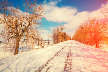 Country road covered with snow in winter