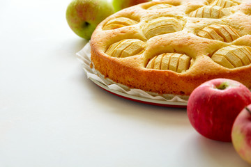 Homemade apple pie on gray wooden desk