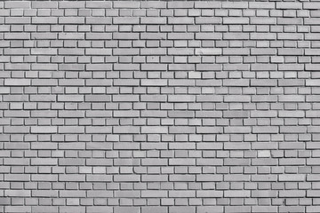 Quiet gray colored brick wall background