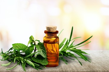 Essential Oil with Rosemary Sprig Isolated
