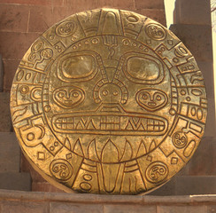 Relief bronze panels of Inca symbols