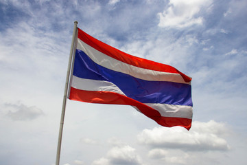 The Thai flag has a sky background with clouds in the sun at noon.