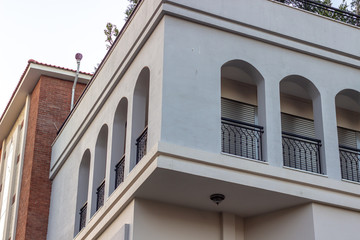 Obraz premium Perspective 2-storey building gray colored facade corner at Lesvos in Aegean region