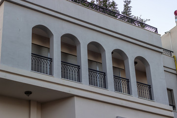 Fototapeta na wymiar Perspective 2-storey building gray colored facade at Lesvos in Aegean region