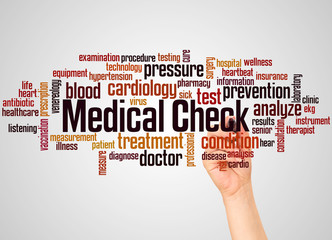 Medical check word cloud and hand with marker concept