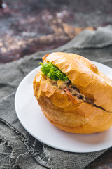 Bread with mayonnaise on rustic background