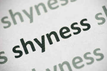 word shyness printed on paper macro