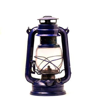 Old kerosene lamp on a white background
