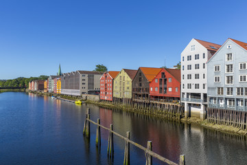 Colorful old storehouses along the river Nidelva in Trondheim