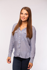 Business portrait. Close up portrait of a young blonde woman in shirt