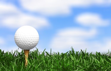Golf ball with grass on sky background