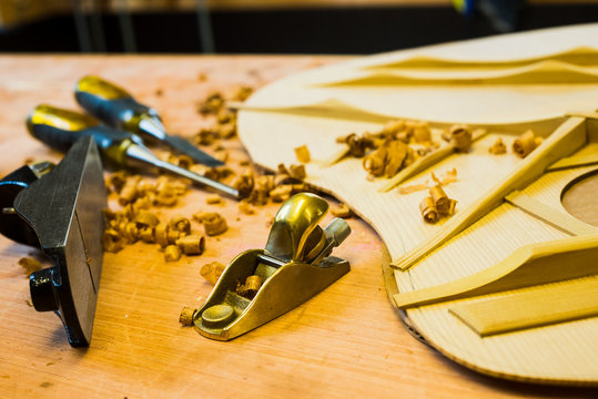 Wood shavings and woodworking tools, guitar building