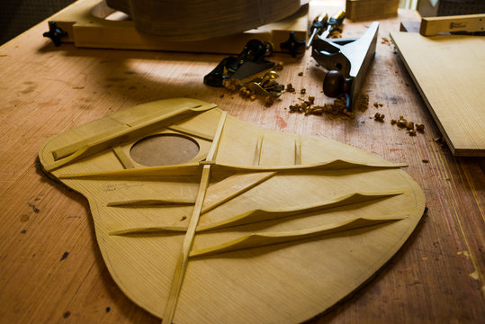 Wood shavings and woodworking tools, guitar building - Powered by Adobe