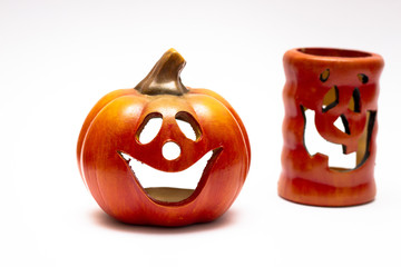 pumpkin on white background, workout for Halloween postcards. Halloween Pumpkin Candle.