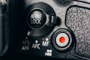 Auto-Focus, Auto-Exposure Lock Dial And Movie Record Button On Digital Camera