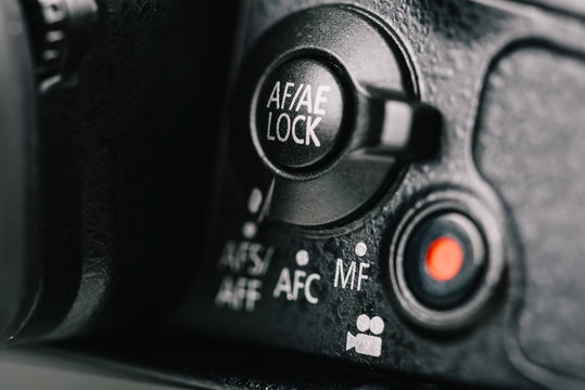 Auto-Focus, Auto-Exposure Lock Dial And Movie Record Button On Digital Camera