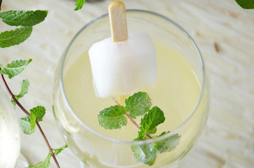 Fresh drink with mint and popsicle