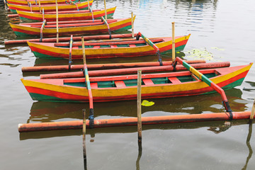 Fototapeta na wymiar Traditional colorful fishing boats on the lake,Bali, Indonesia