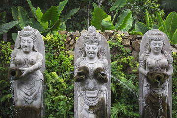 Traditional stone statues depicting demons, gods and Balinese mythological deities in Bali,Indonesia