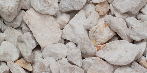 pile of untreated stone in marble or granite of different sizes