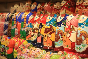 A lot of souvenirs of nesting dolls. Many colored nesting dolls.