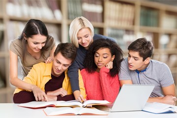 Four Young students studying subject on background