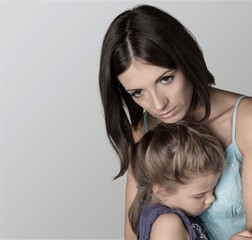 Portrait  of sad Mother with daughter