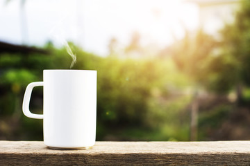 white ceramic coffee cup in the morning.