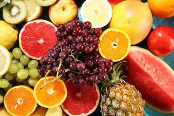 Naklejka na ściany i meble Fresh organic fruits background. Healthy eating concept.