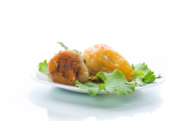 stewed in tomato sauce stuffed peppers in a plate