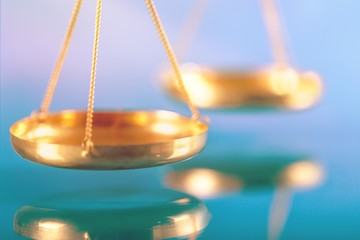Law scales on table background