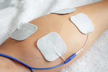 Electro-stimulation session of the twin with patches