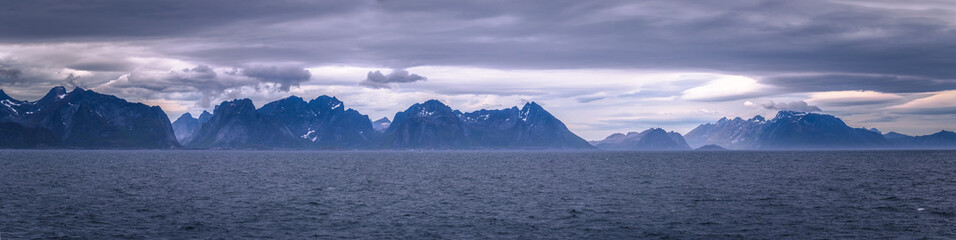 Fototapeta na wymiar Coastline of the Lofoten Islands from the ferry coming from Bodo, Norway