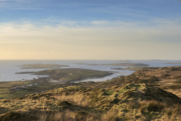 Fototapeta na wymiar West coast of Ireland, View from Sky road, Clifden, County Galway, Landscape, Atlantic ocean, sky, islands, rough terrain, Famous tourists attraction.
