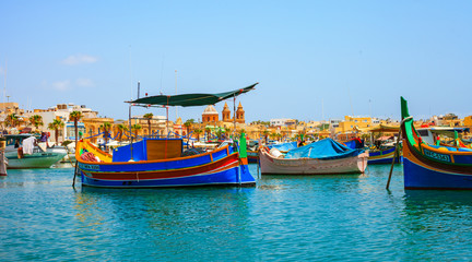 Fototapeta na wymiar Colorful fishing village of Marsaxlokk in Malta 