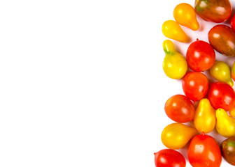 various colorful tomatoes isolated on white background